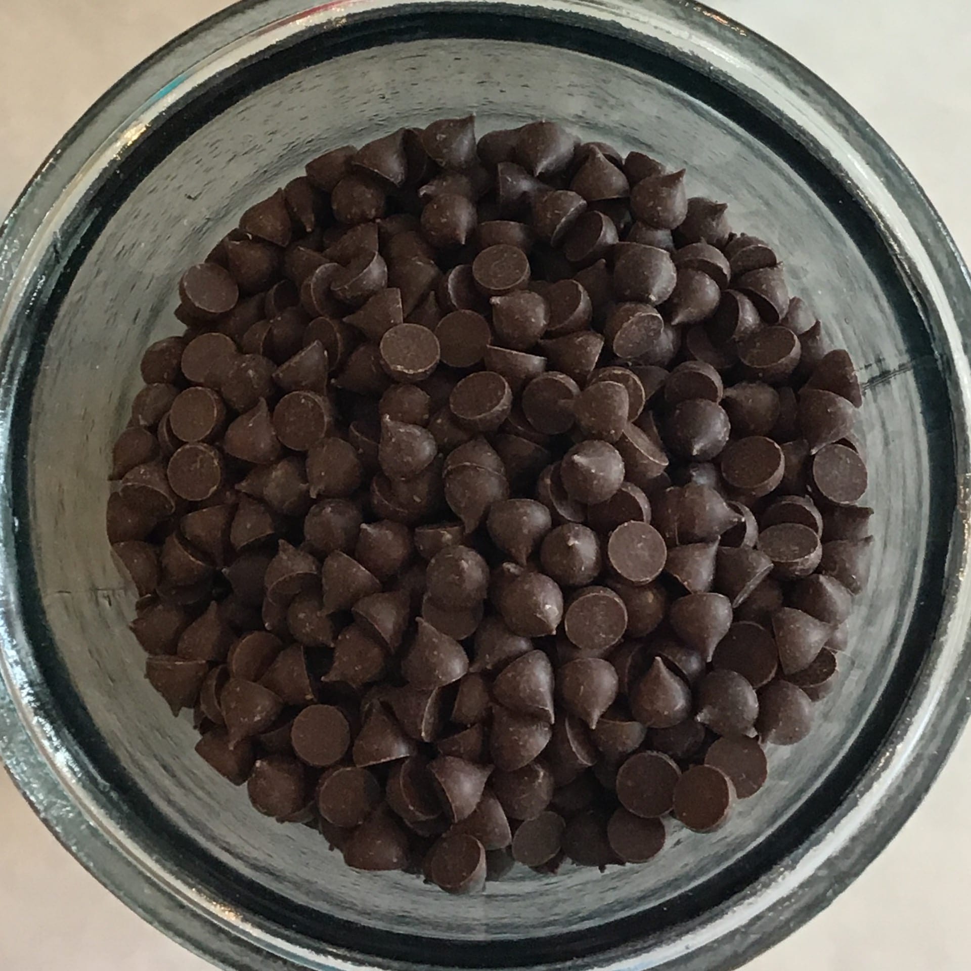Vegan dark chocolate chips at 55% cocoa powder content, bring in your own container from home to refill