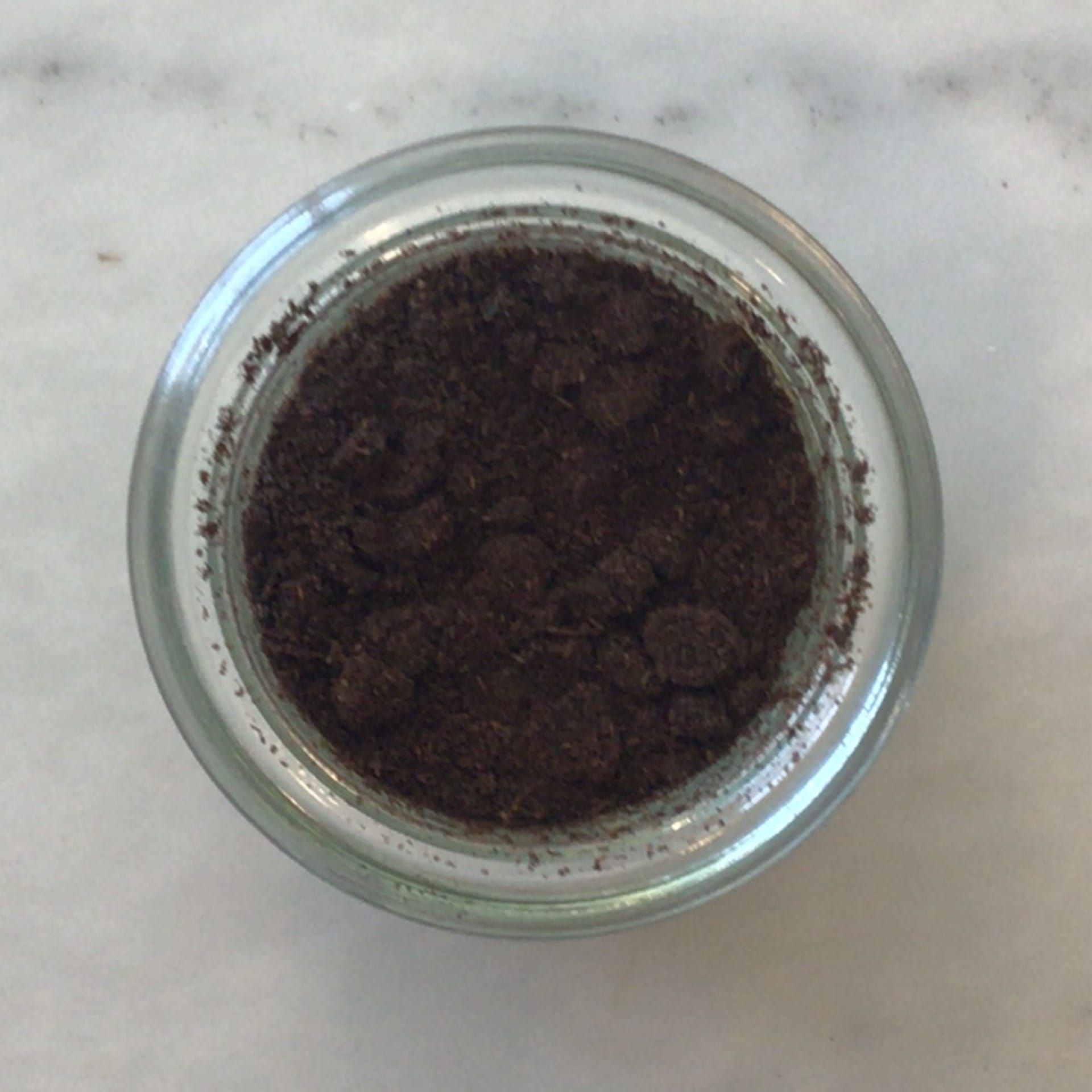 Whole vanilla beans ground into a fine powder